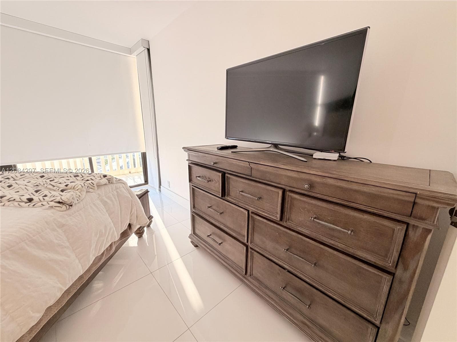 Bedroom #2 with plenty of storage and TV.