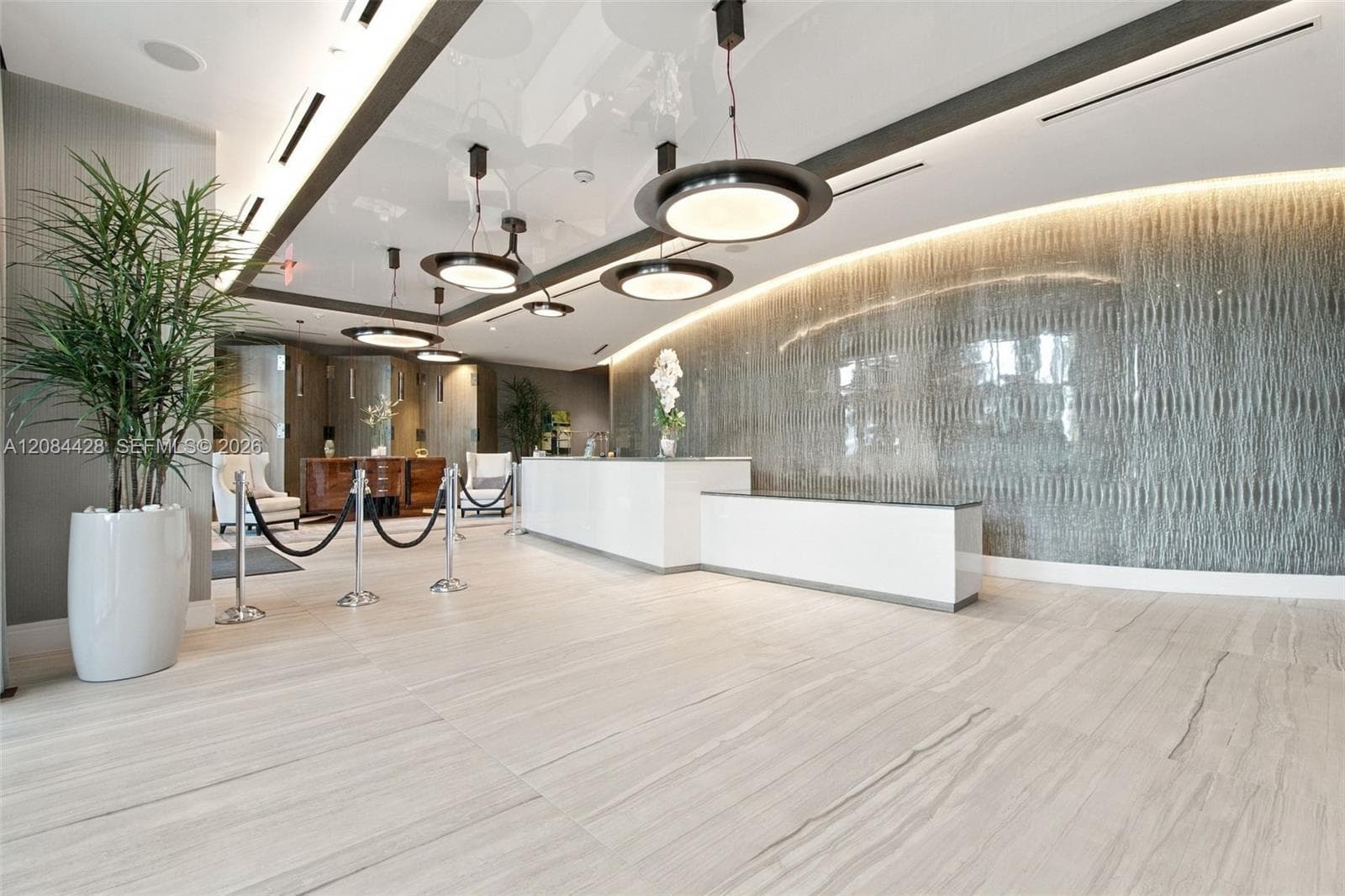 Elegant, contemporary reception area with attentive front-desk service.