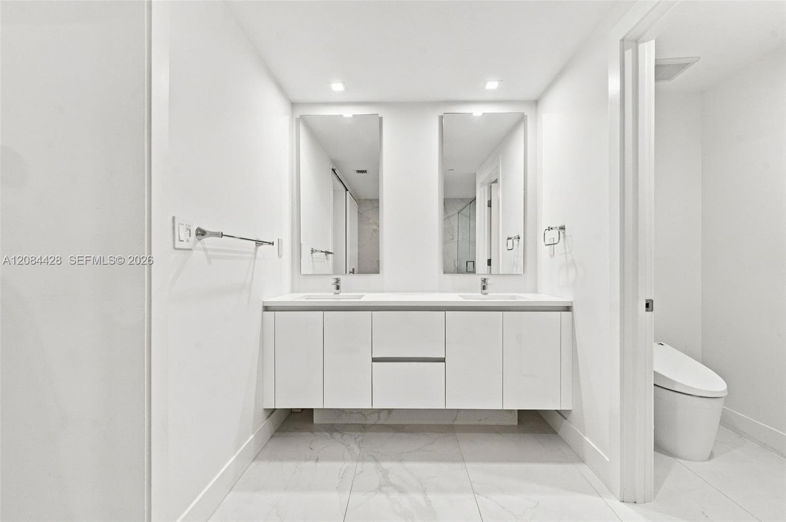 Dual sink vanity with generous storage.