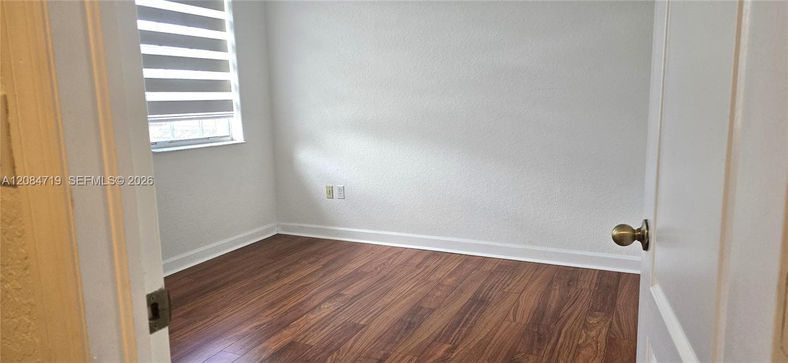 The bedroom has a private bathroom attached.