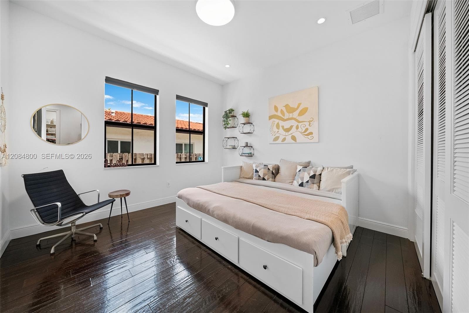 Spacious guest bedroom with  generous closet space