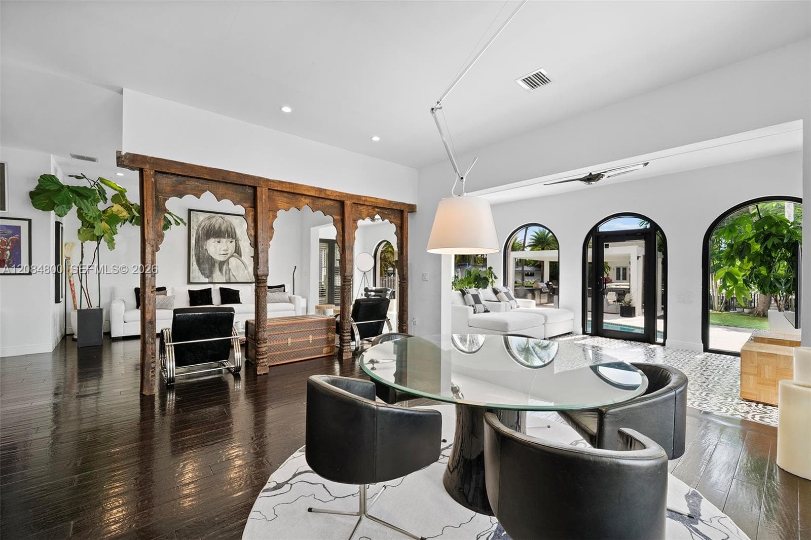Floor-to-ceiling arches and windows — natural light in every corner