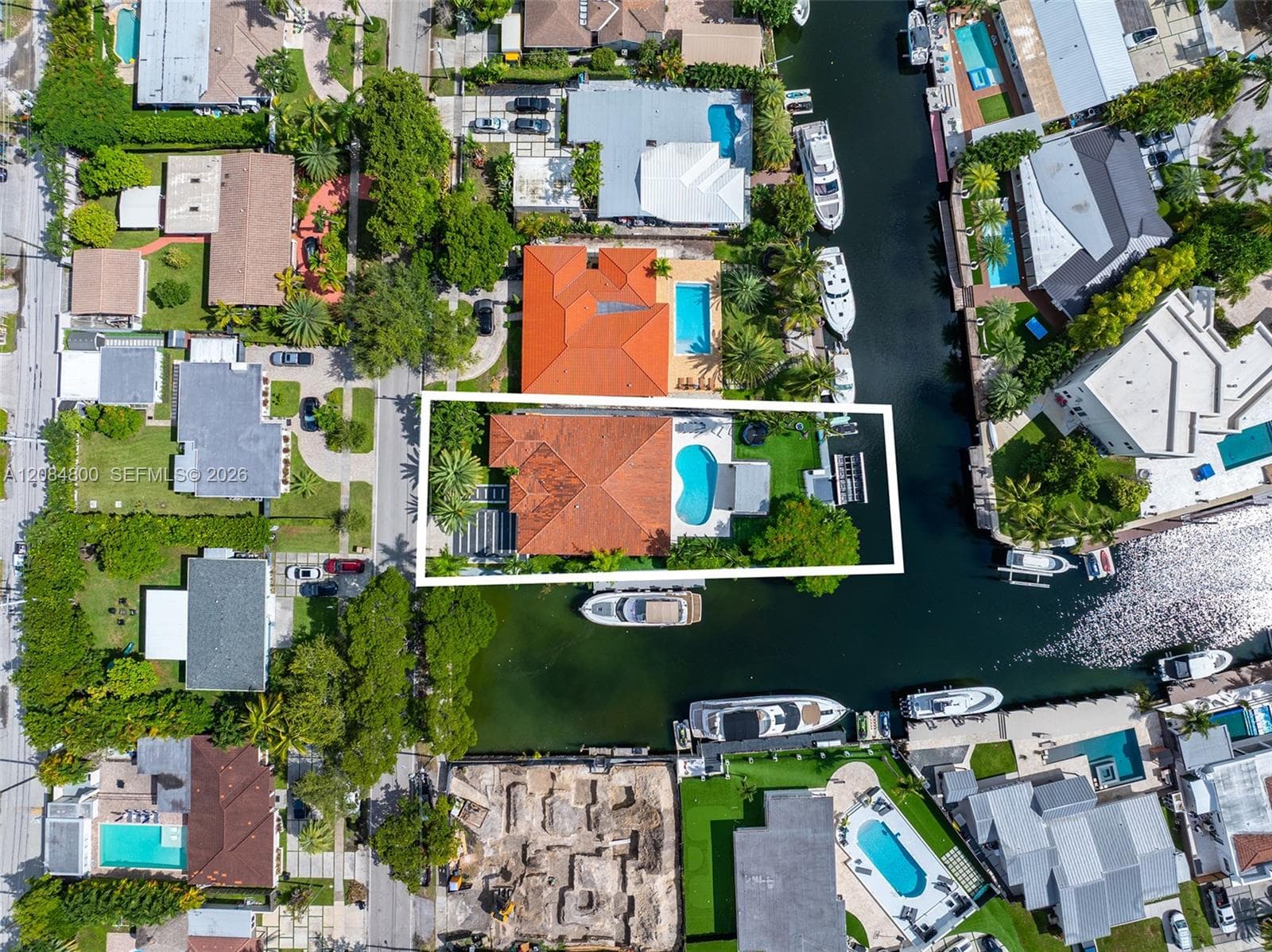272 feet of double waterfront on a 12,300 SF corner lot