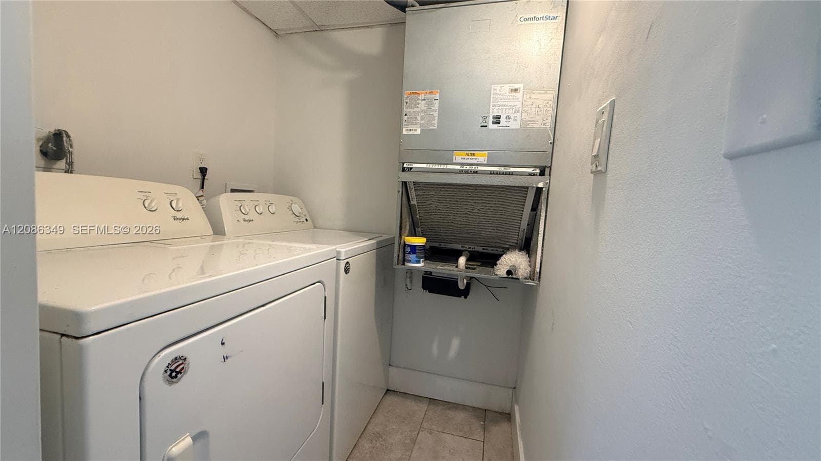 Inside unit Washer & Dryer.