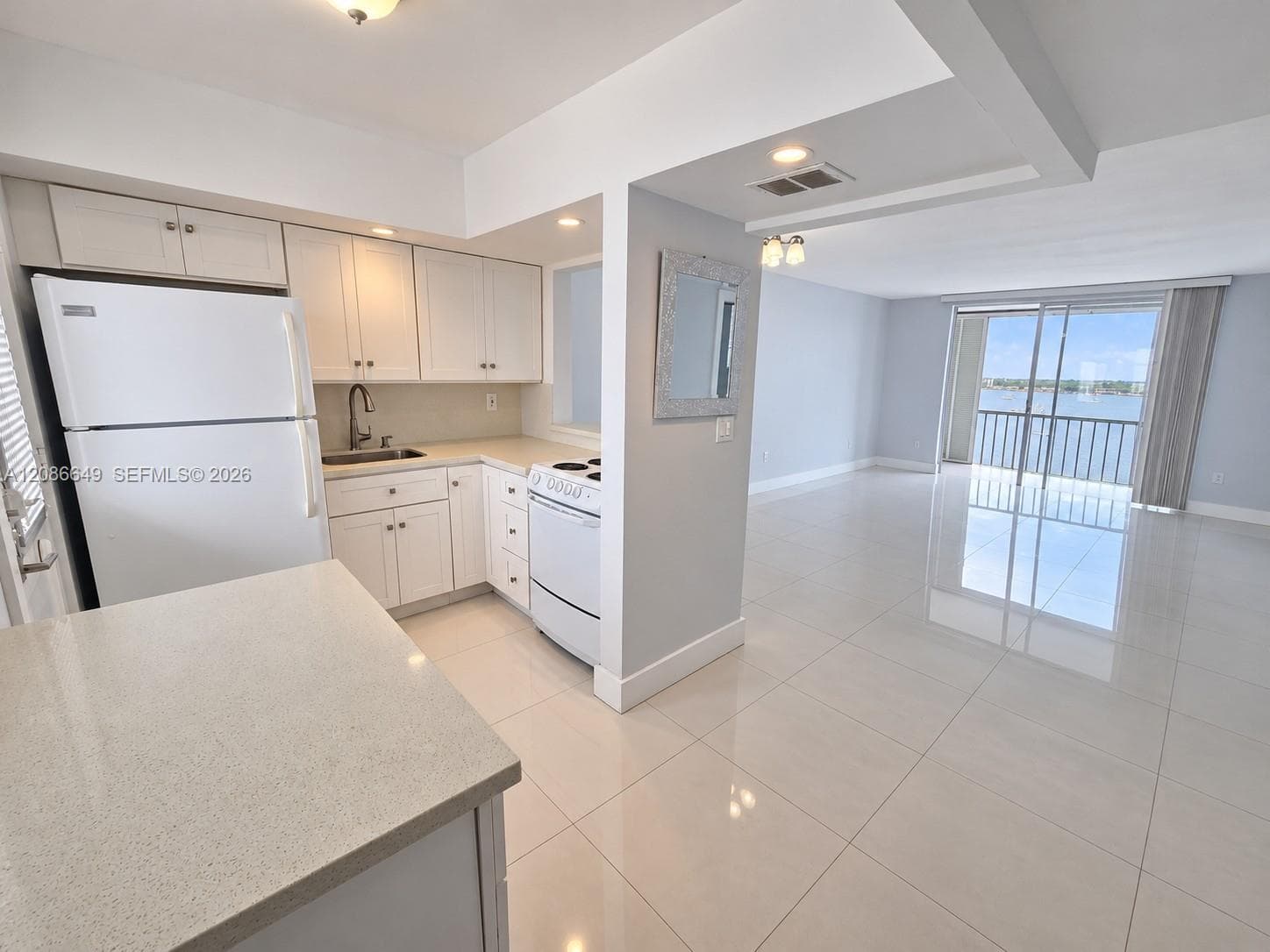 Unit Entrance- Open Concept Kitchen Living and Balcony