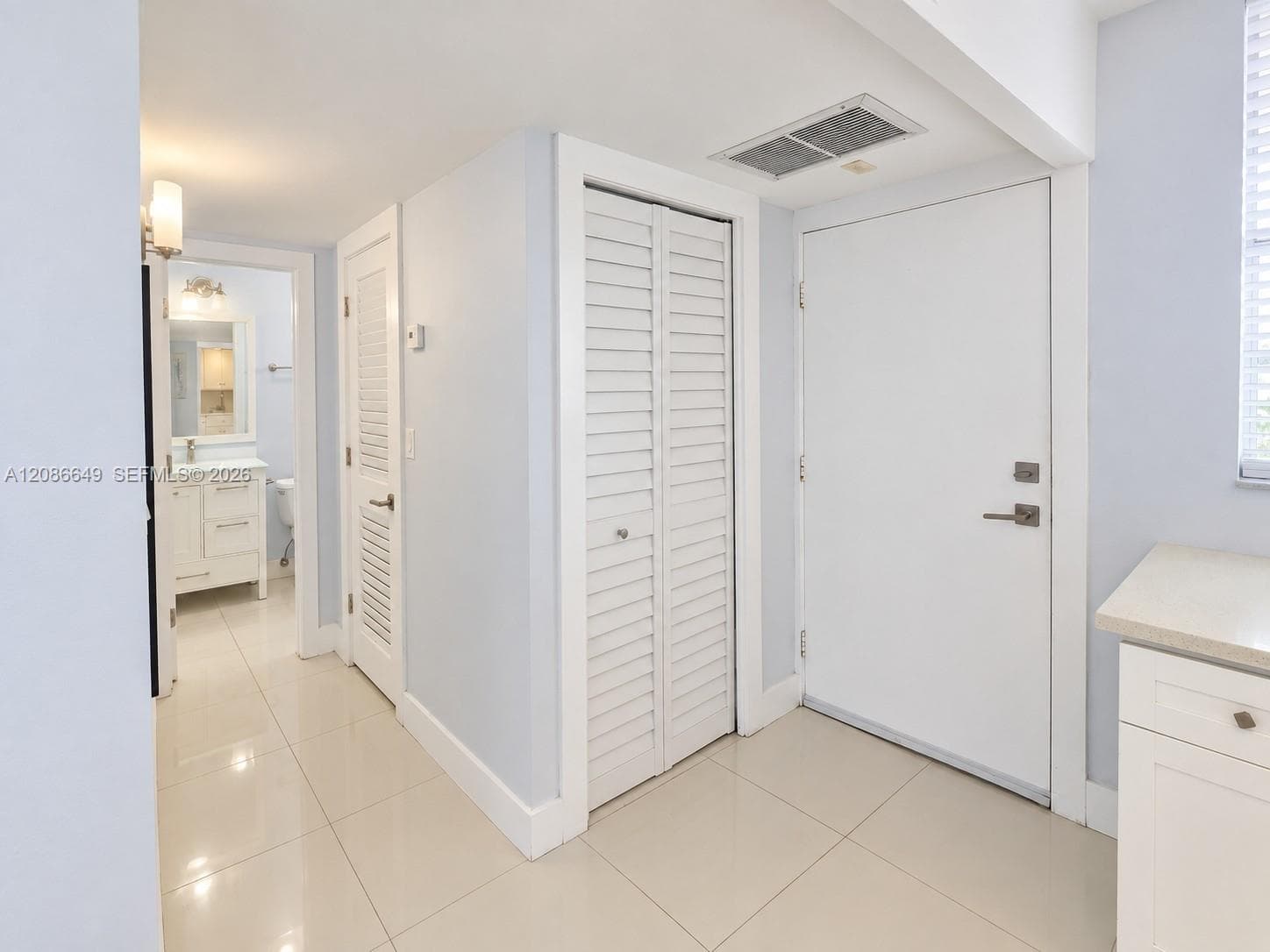 Entrance- 1st Storage Closet and Bathroom Hallway
