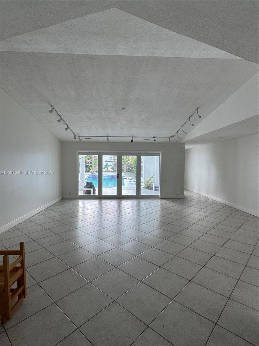 Living room overlooking pool
