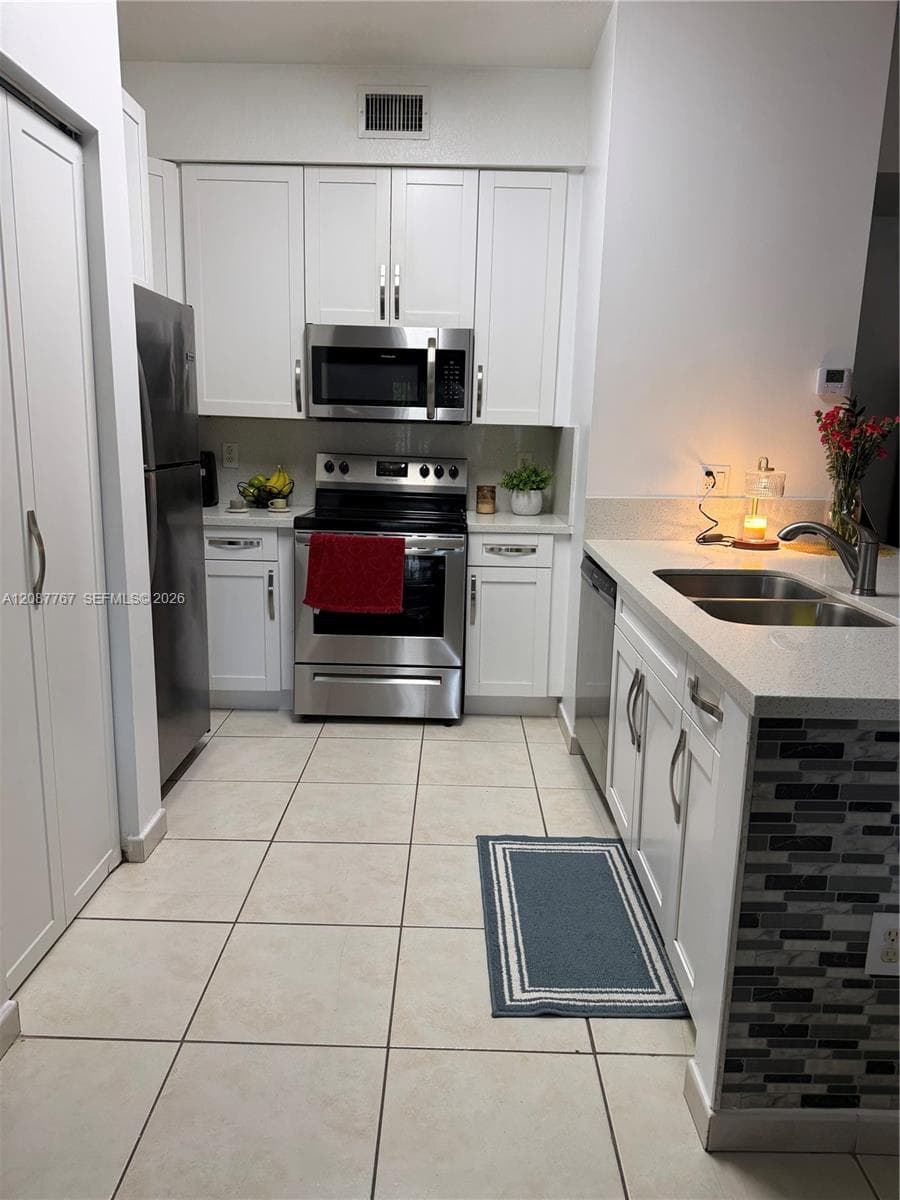 PALM GARDENS AT DORAL CON · #20515 in Doral - Photo 10