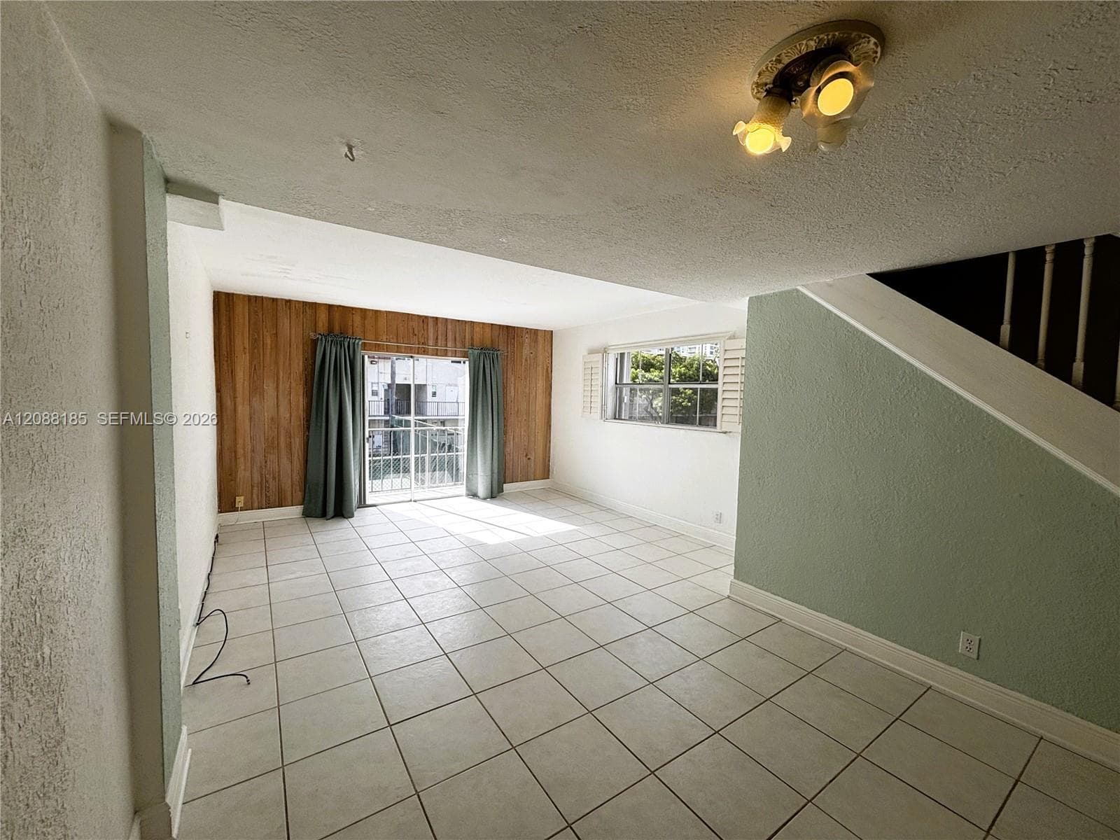 Dining Area with Living Room in the background