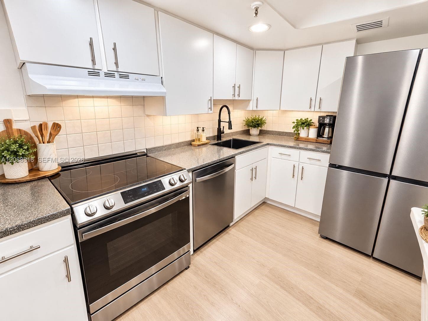 Kitchen with stainless steel appliances