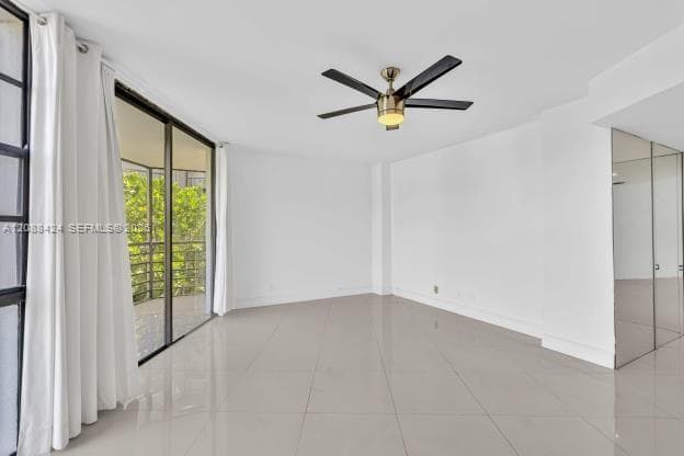 LIVING ROOM - ENTRANCE TO BALCONY