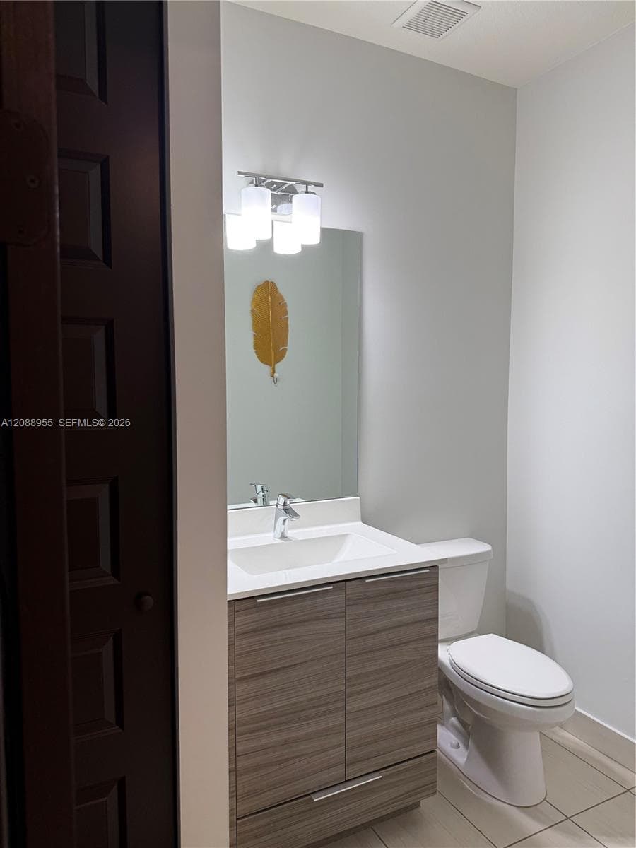 half bath by foyer
