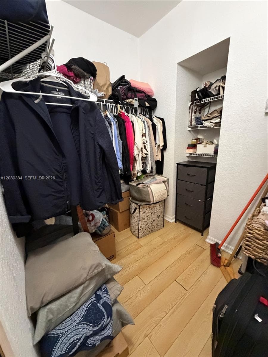 Walk-in closet in the primary bedroom