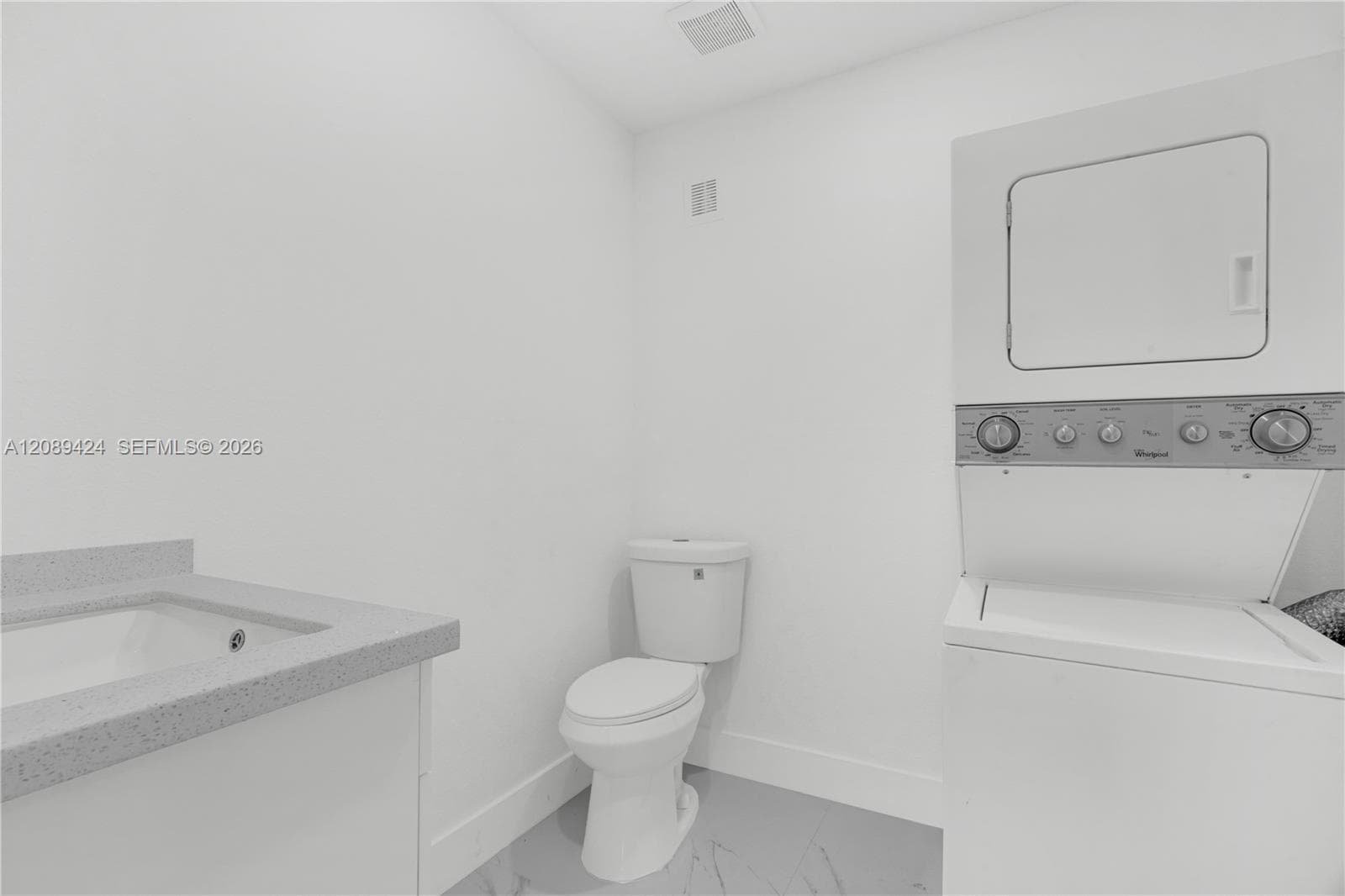 HALF BATHROOM/LAUNDRY ROOM
