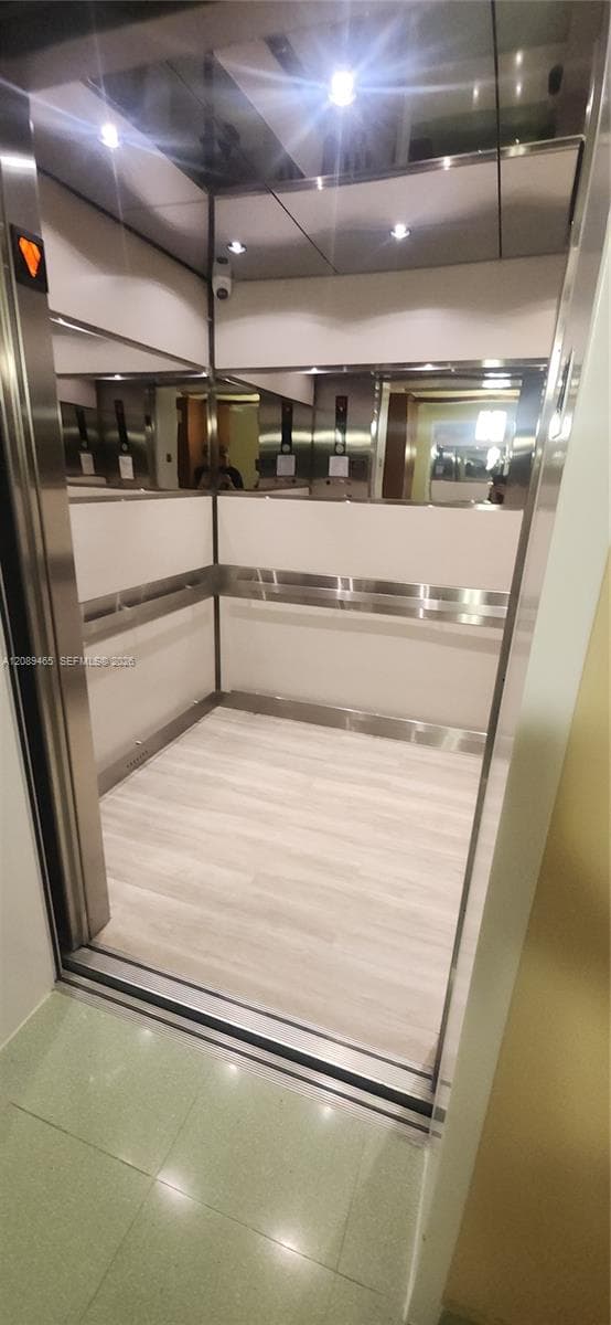 Modern fast elevators with 3 on each floor