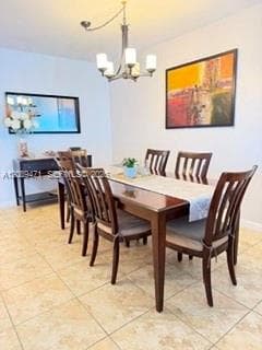 Ceramic tile flooring and a multi-arm metallic chandelier with frosted glass shades