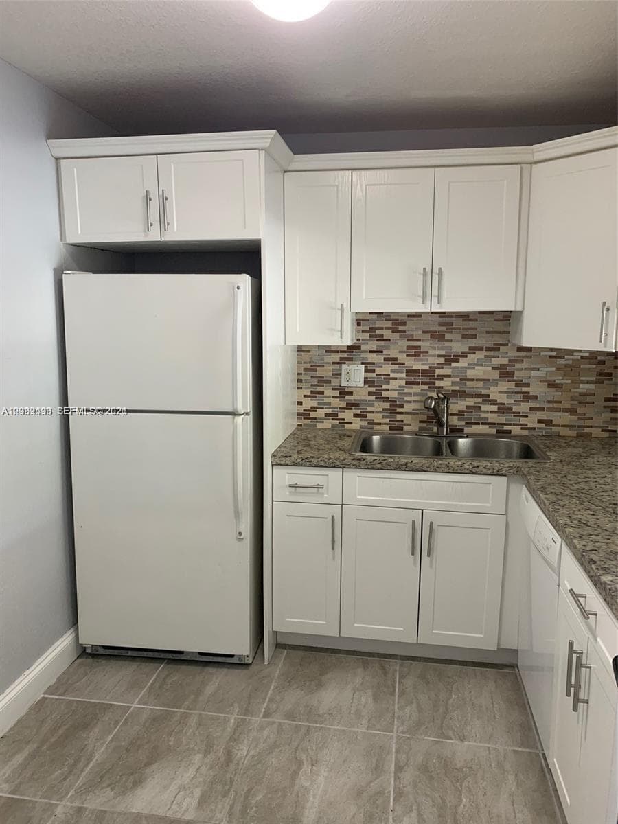 DORAL GARDENS II CONDO · #207 in Doral - Photo 32