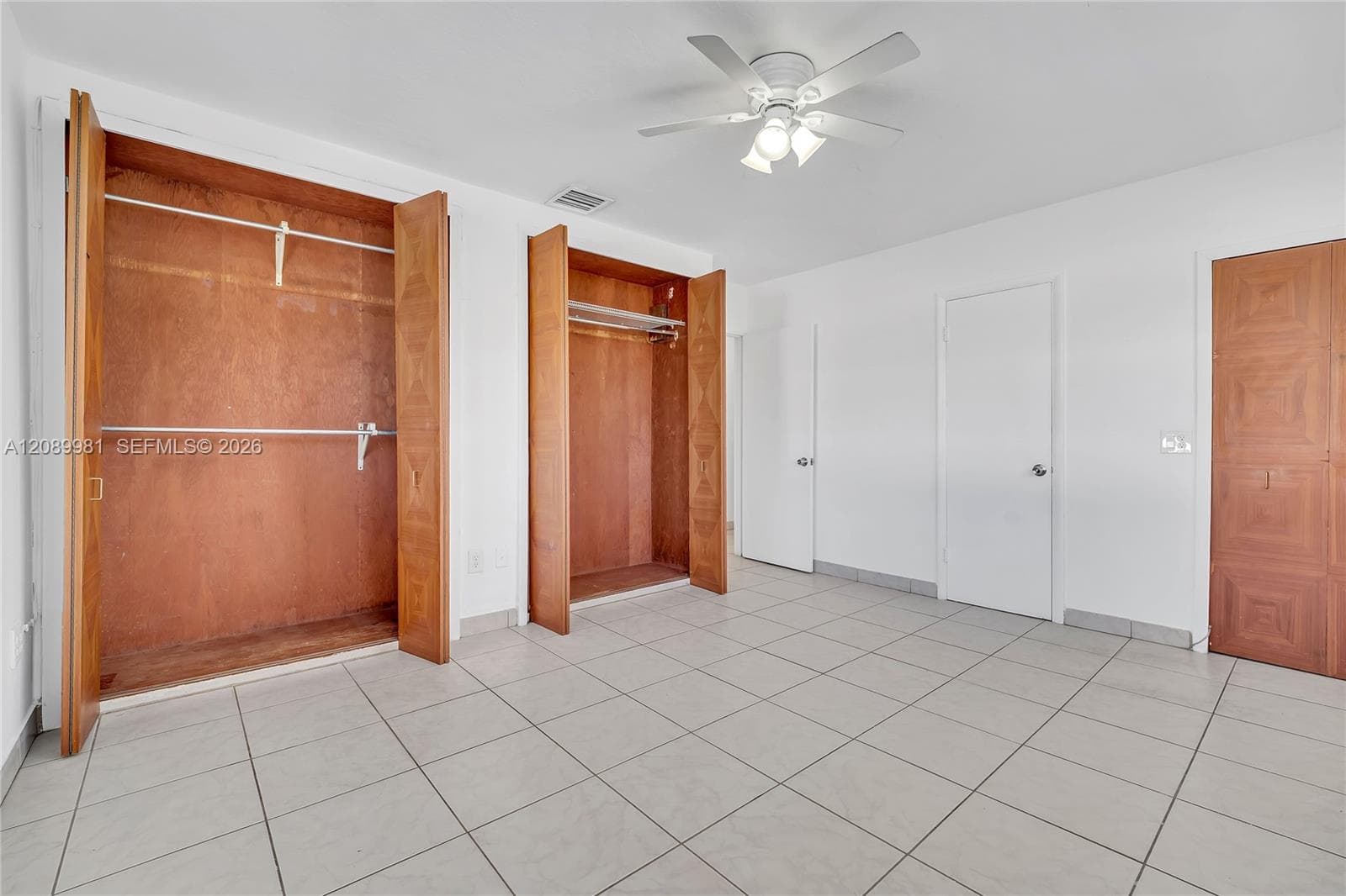 Main bedroom with 3 closets.14.2 X 12.9