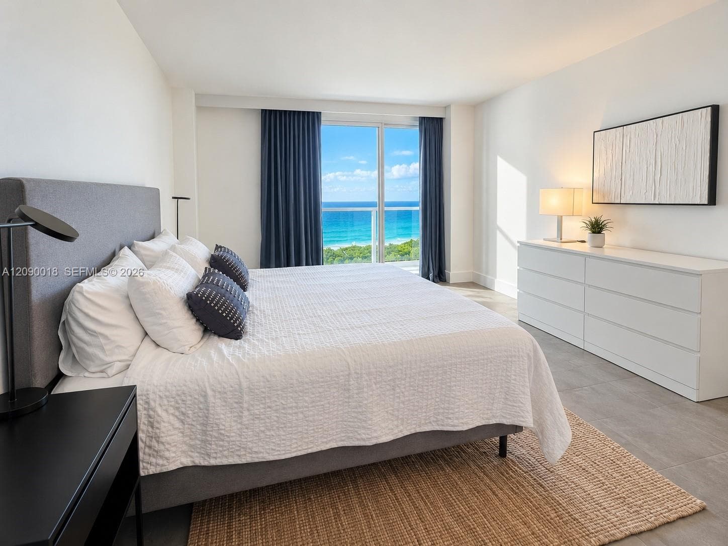 Spacious primary suite featuring a comfortable king bed.