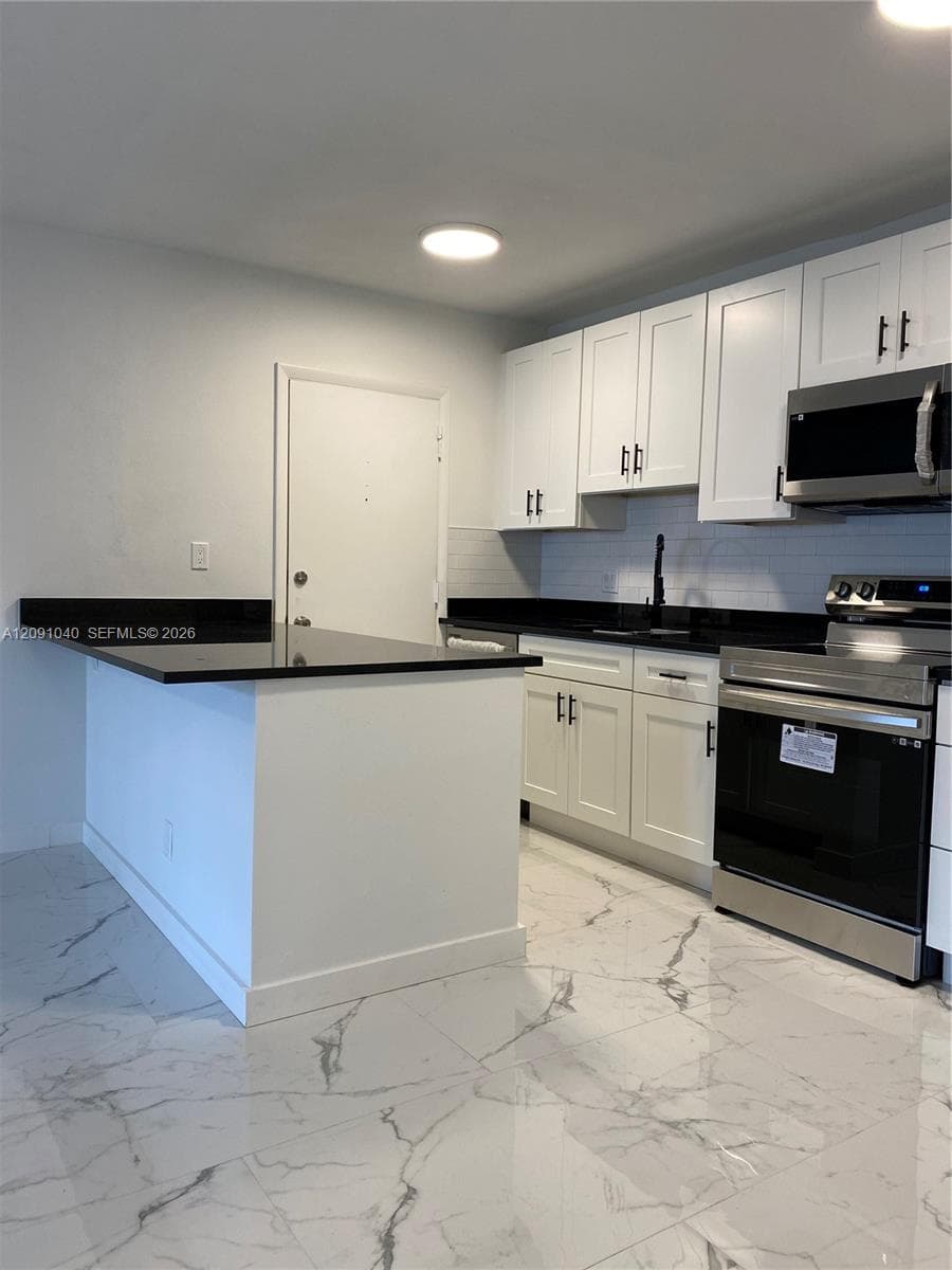 EVERETT ARMS CONDO · #616 in Pompano Beach - Photo 4