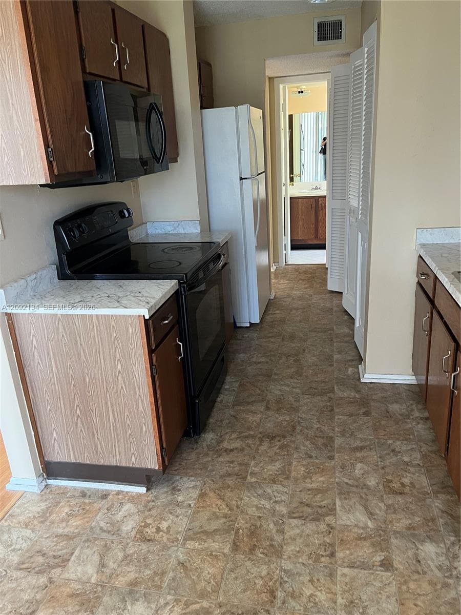BLUE LAKE APTS CONDO · #401 in Pompano Beach - Photo 6