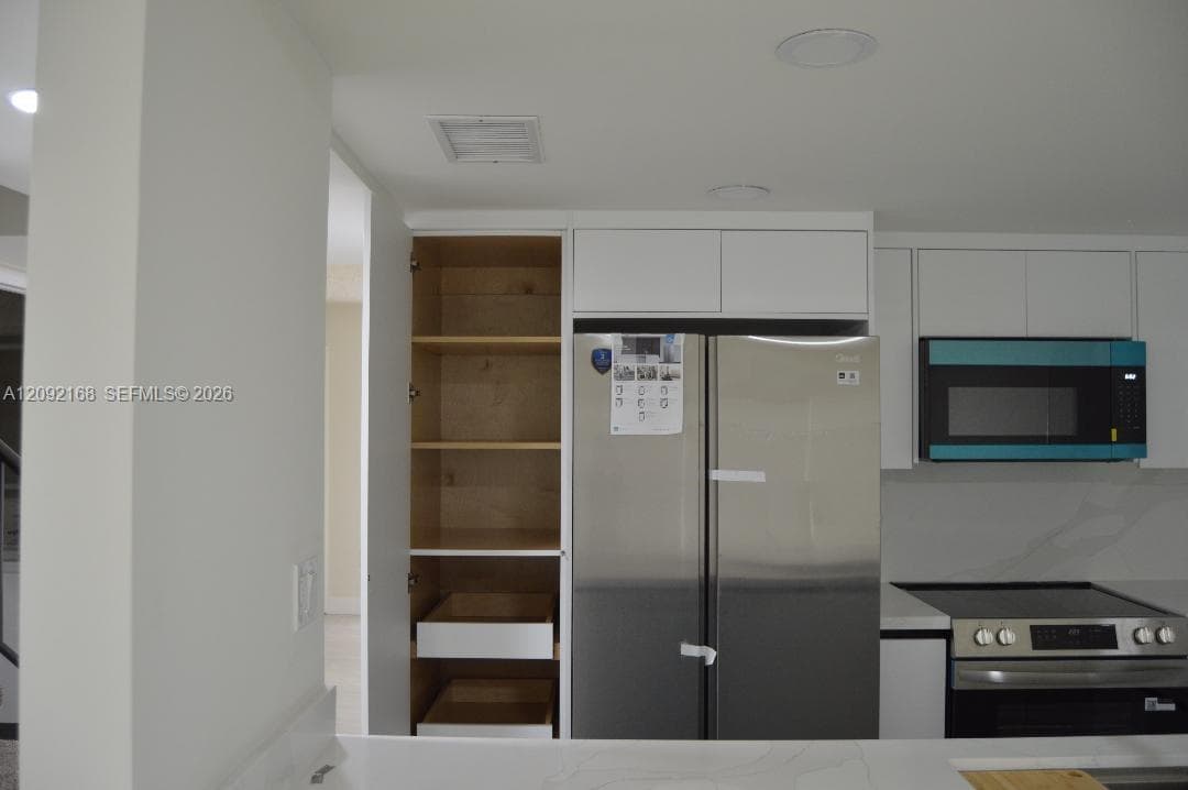 PLENTY OF KITCHEN CABINETS