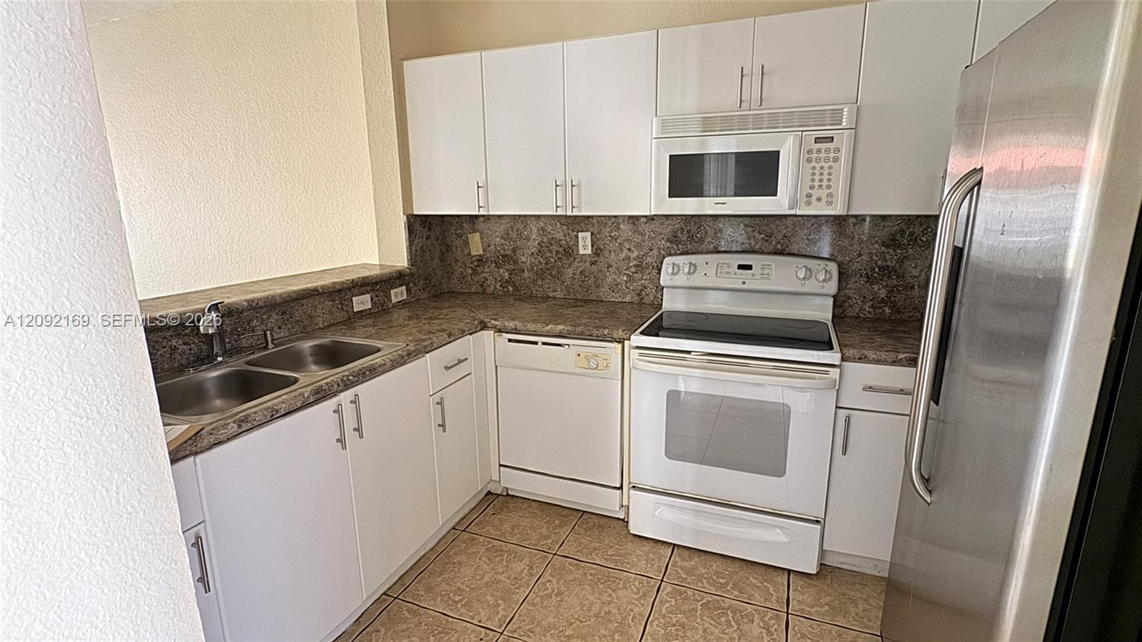 SHOMA HOMES AT COUNTRY CL · #104-18 in Hialeah - Photo 8