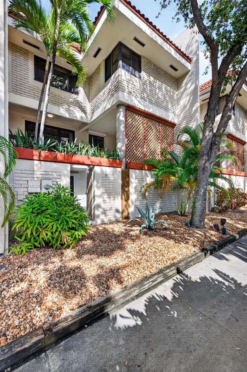 The Back View of the Townhouse Highlights the Beautiful Landscaping Around the Community