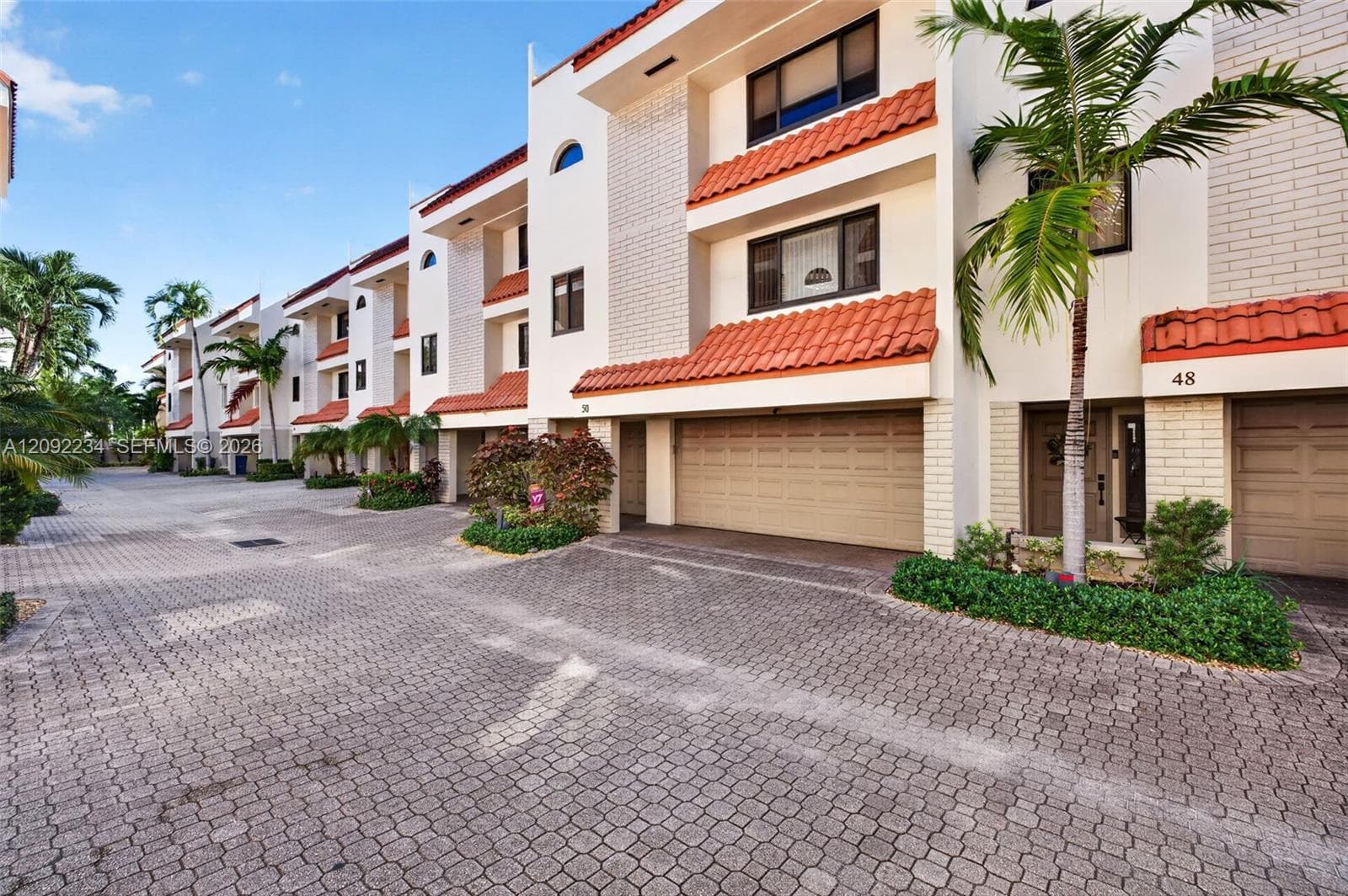 Spacious Two Car Garage with Hurricane Garage Doors