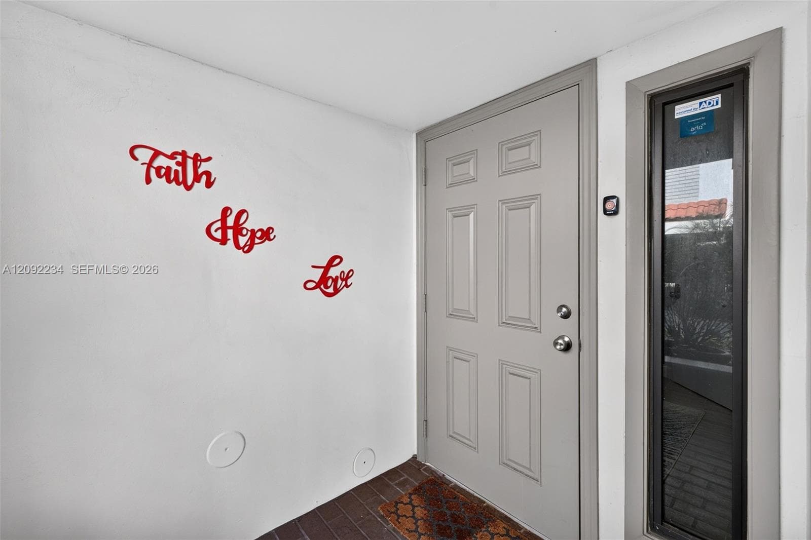 Hurricane Impact Front Entry Door and Sidelight Offer Added Safety