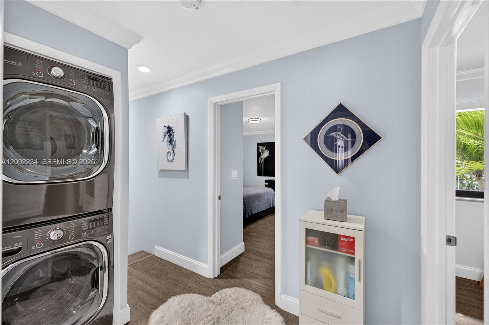 Full Size Stackable Washer and Dryer Were Moved from the Two Car Garage for Convenience and More Space in the Garage