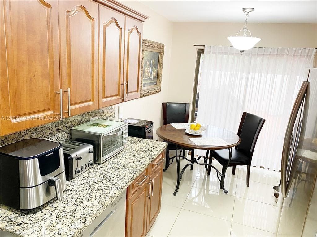 MISTY LAKE SOUTH CONDO PH · #102-28 in Miami Gardens - Photo 3