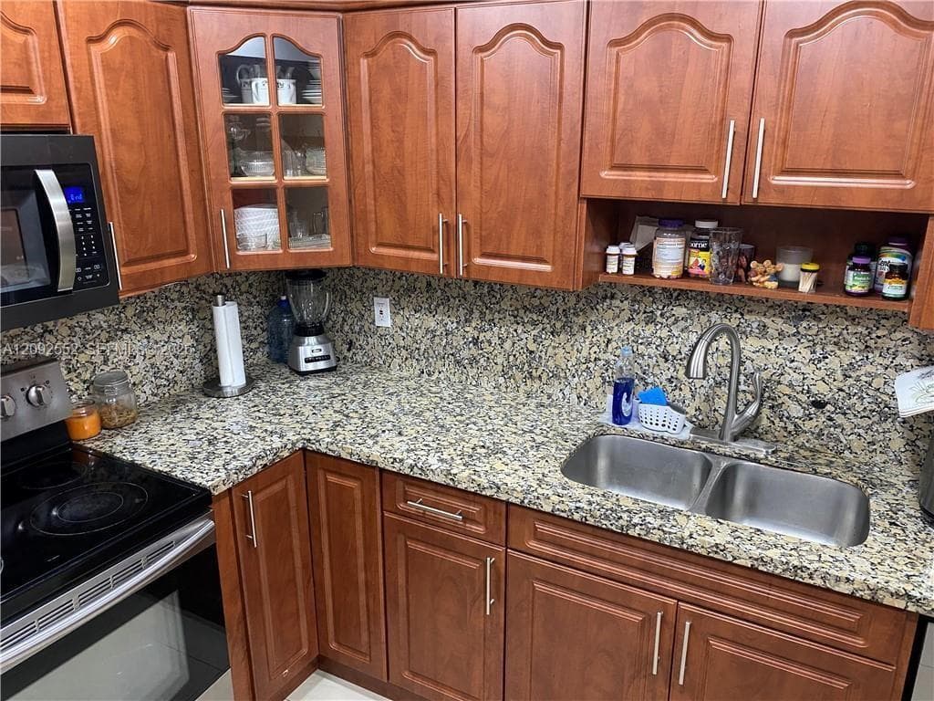 MISTY LAKE SOUTH CONDO PH · #102-28 in Miami Gardens - Photo 5