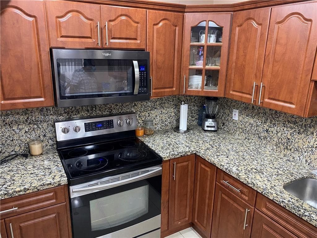MISTY LAKE SOUTH CONDO PH · #102-28 in Miami Gardens - Photo 4