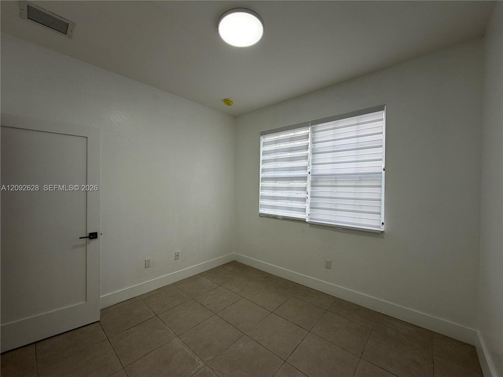 Bedroom #4 located on the first floor floor
