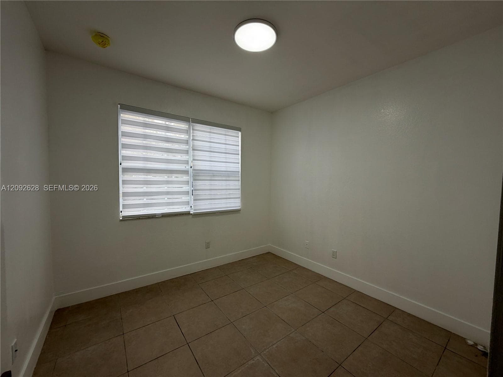 Bedroom #4 located on the first floor floor