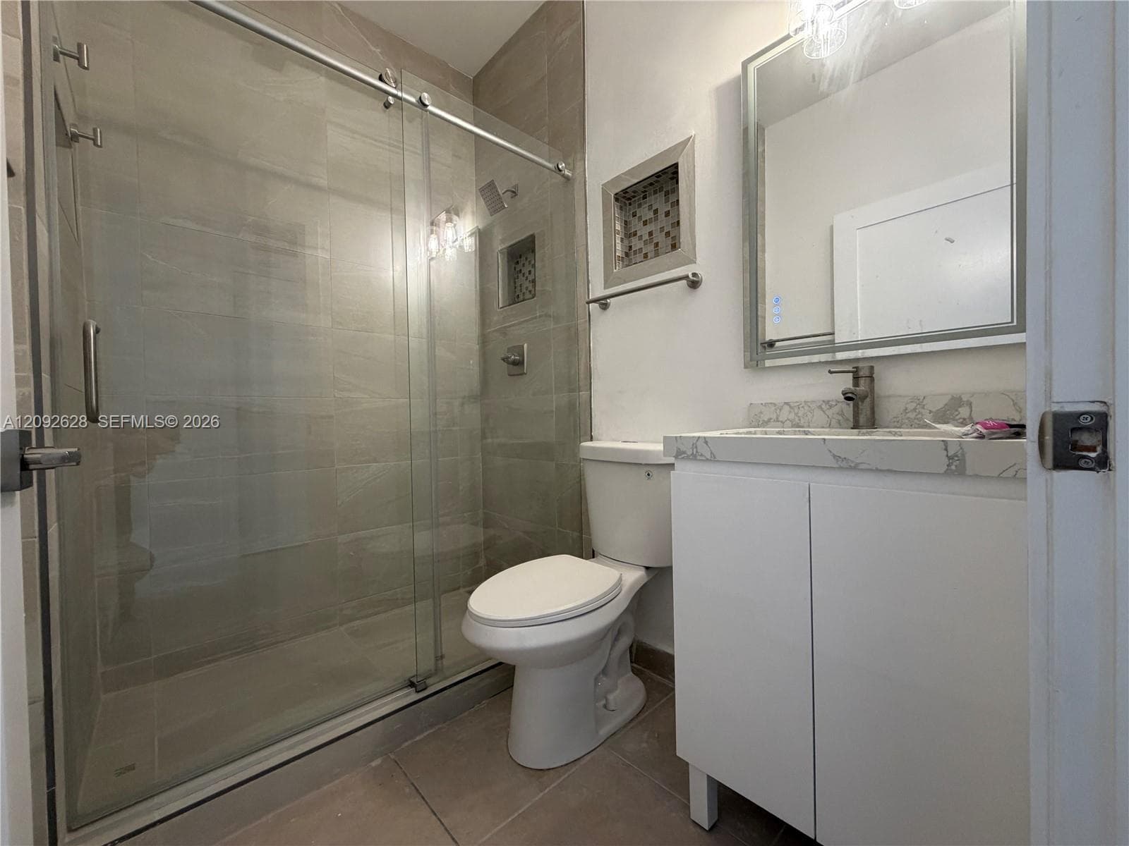 Bathroom # 3 located on the first floor floor