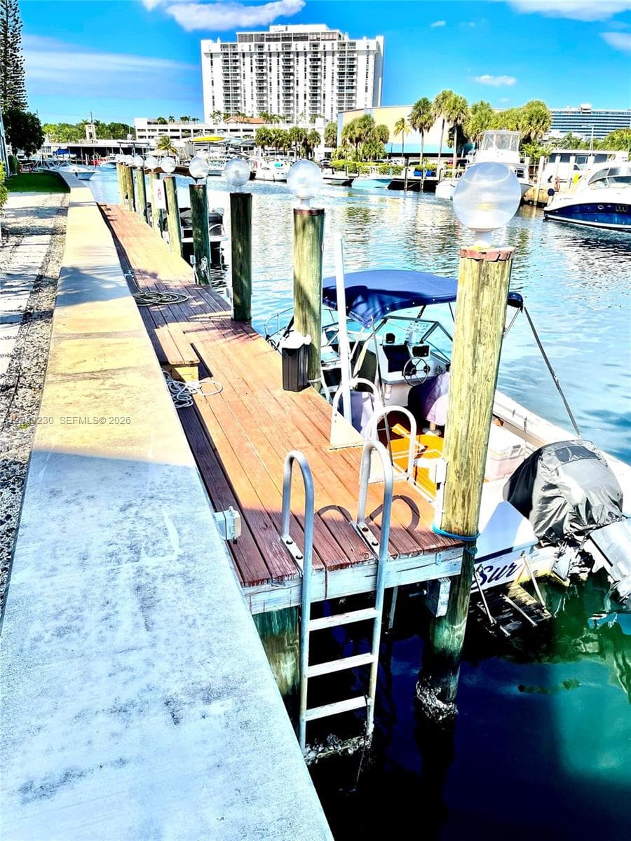 Private boat dock with wood planks and built-in ladder