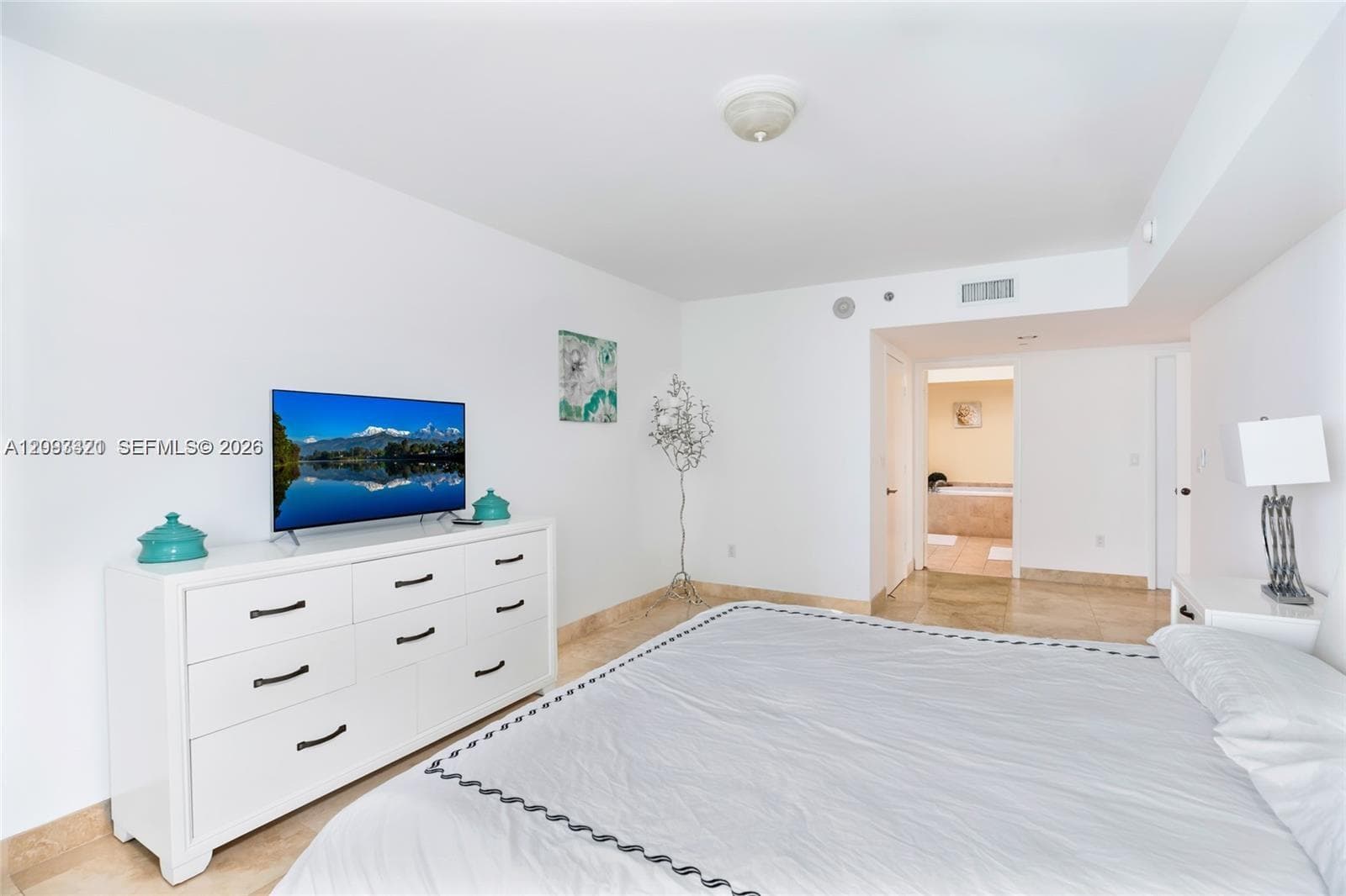 Recessed lighting, tile flooring, and a white ceiling