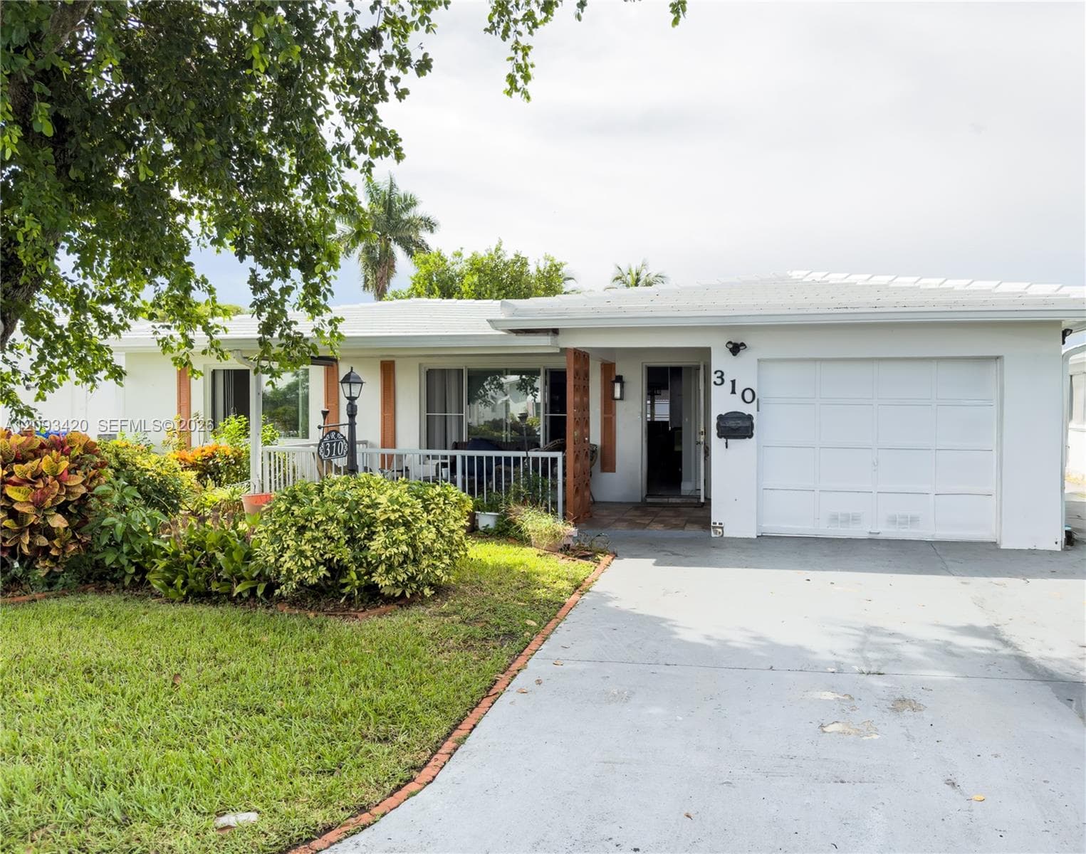 310 NW 25th Ct
