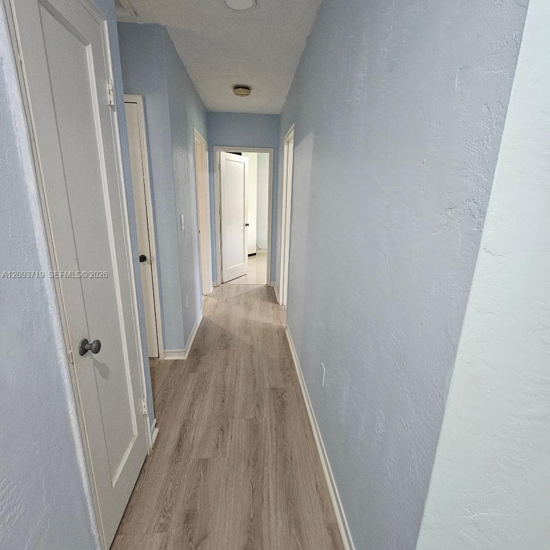 per owner- floor is Cuban tile.  Opens to back yard area