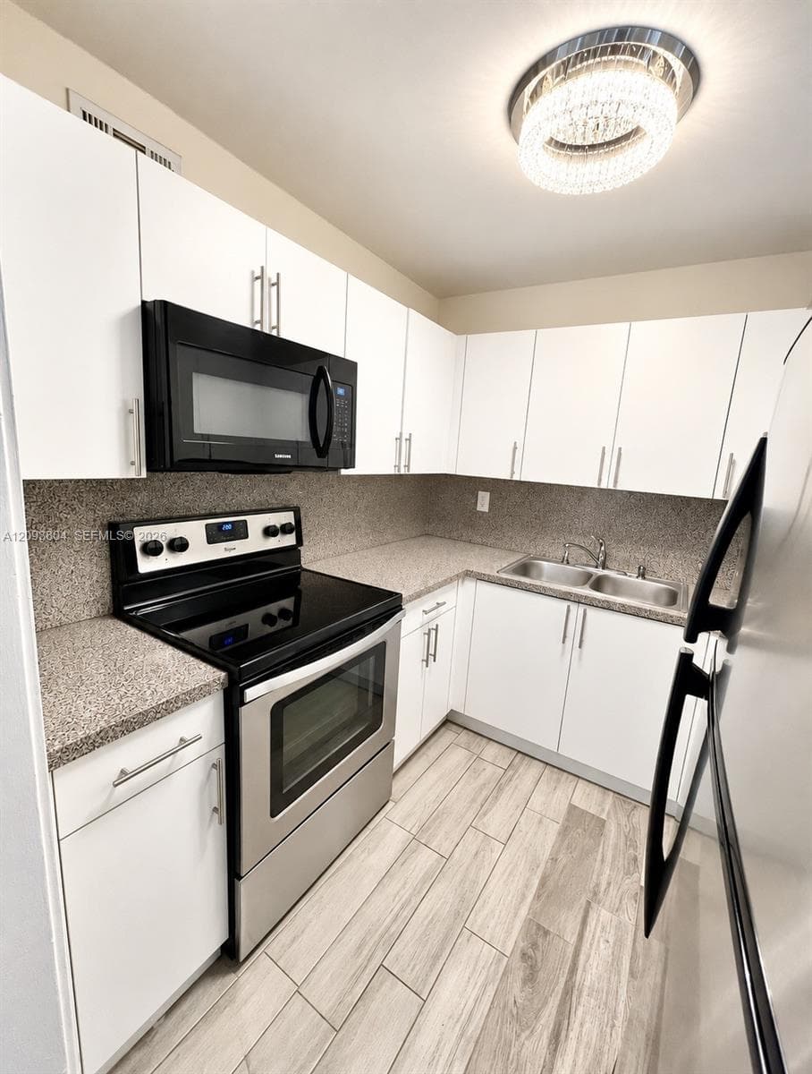 CAMBRIDGE CONDOMINIUMS · #110 in Hialeah - Photo 8