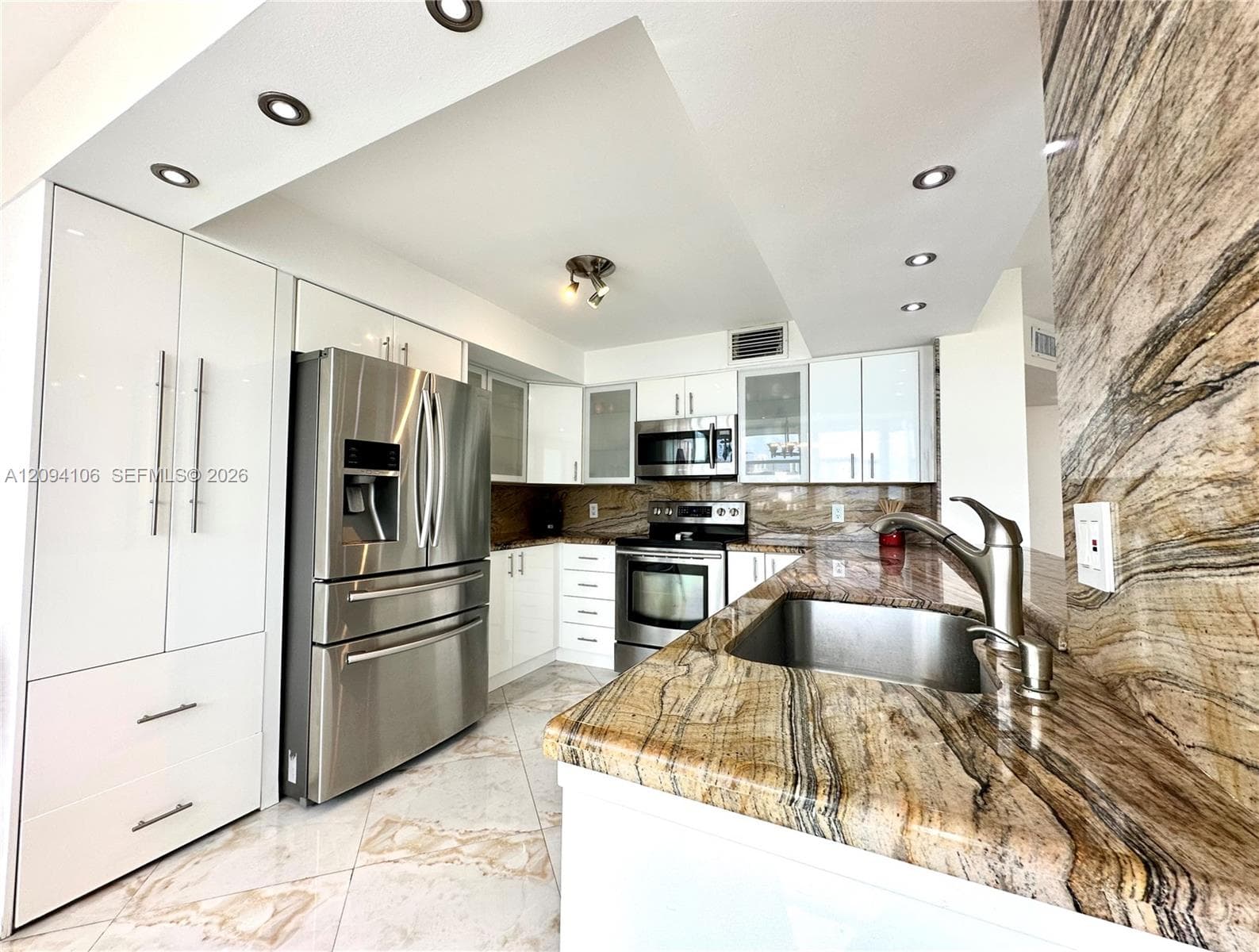 REEF EAST CONDO · #5D in North Miami Beach - Photo 5
