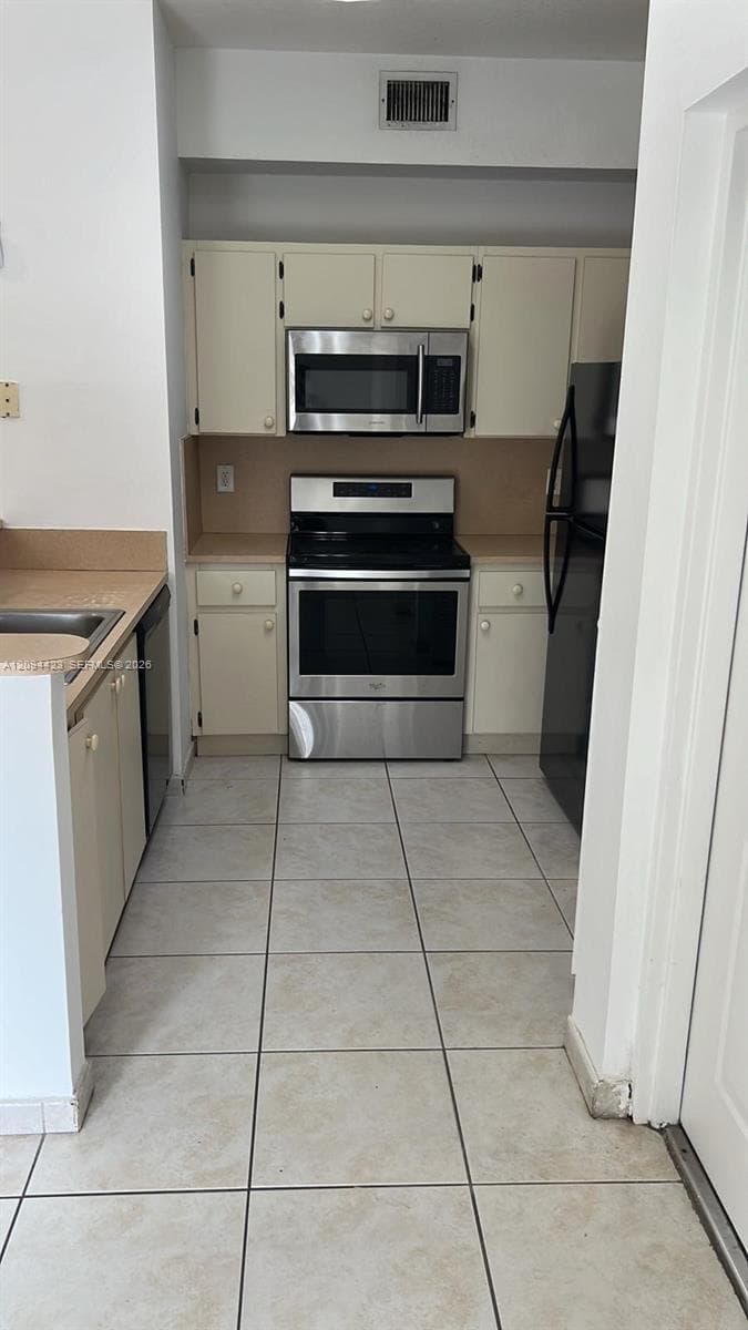 PALM GARDENS AT DORAL CON · #206 in Doral - Photo 1