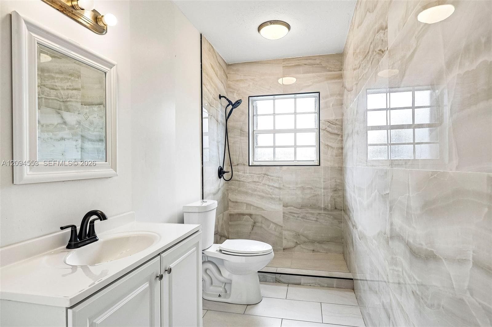 Renovated bathroom with walk-in shower