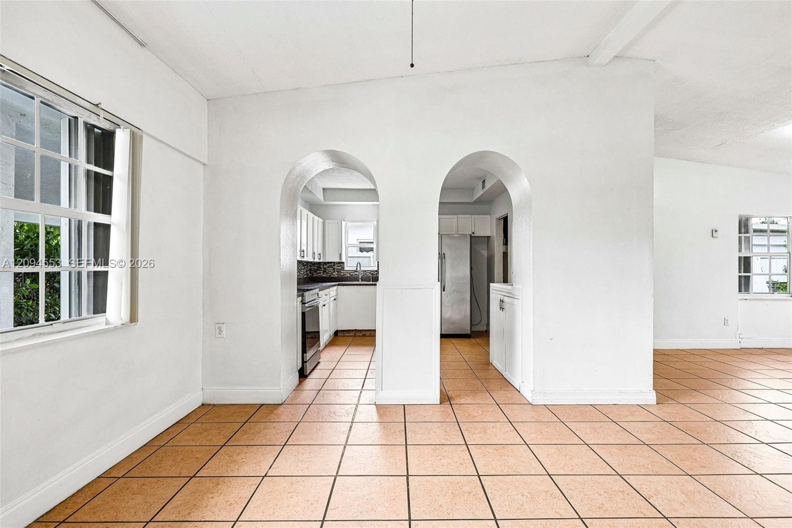 Arched openings into the kitchen