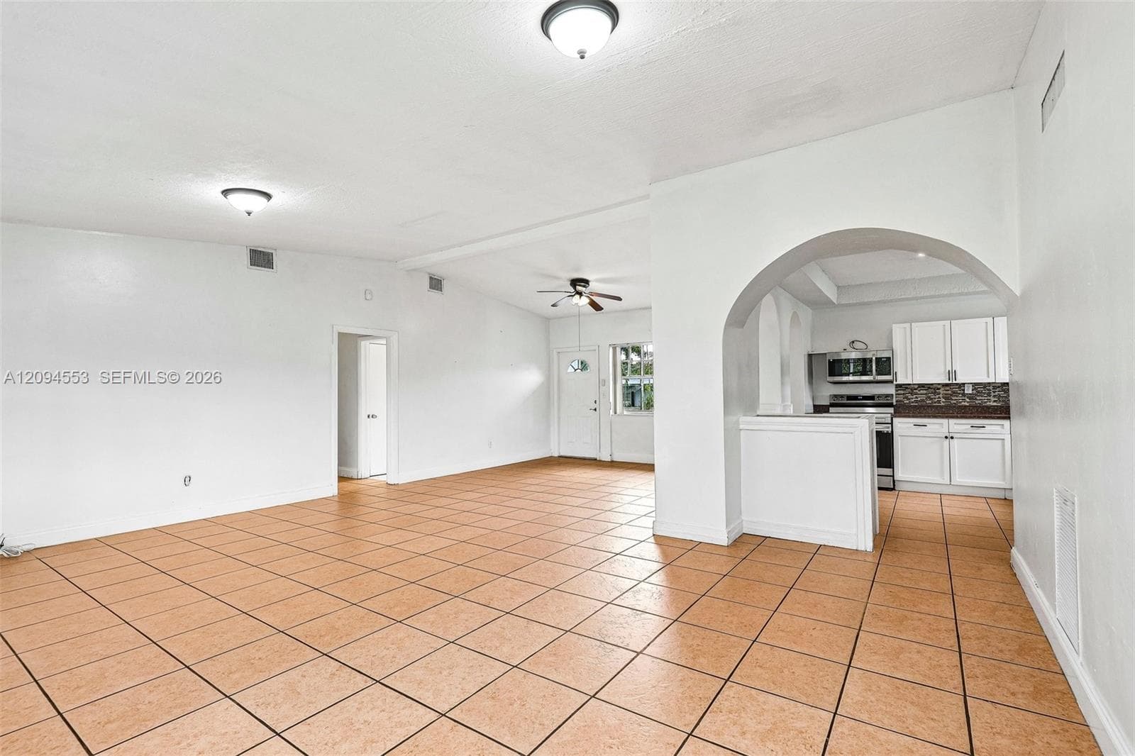 Open layout from the family room to the kitchen and front door