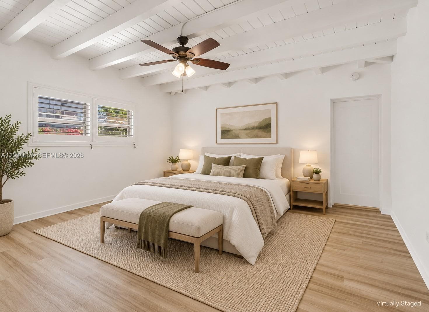 Exposed white-painted ceiling beams, wood-finish flooring, and white plantation shutters