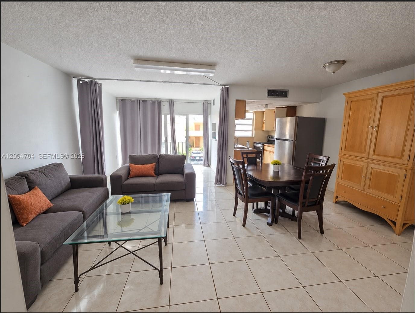 entry level with open concept living room, dining room and flexible bonus space