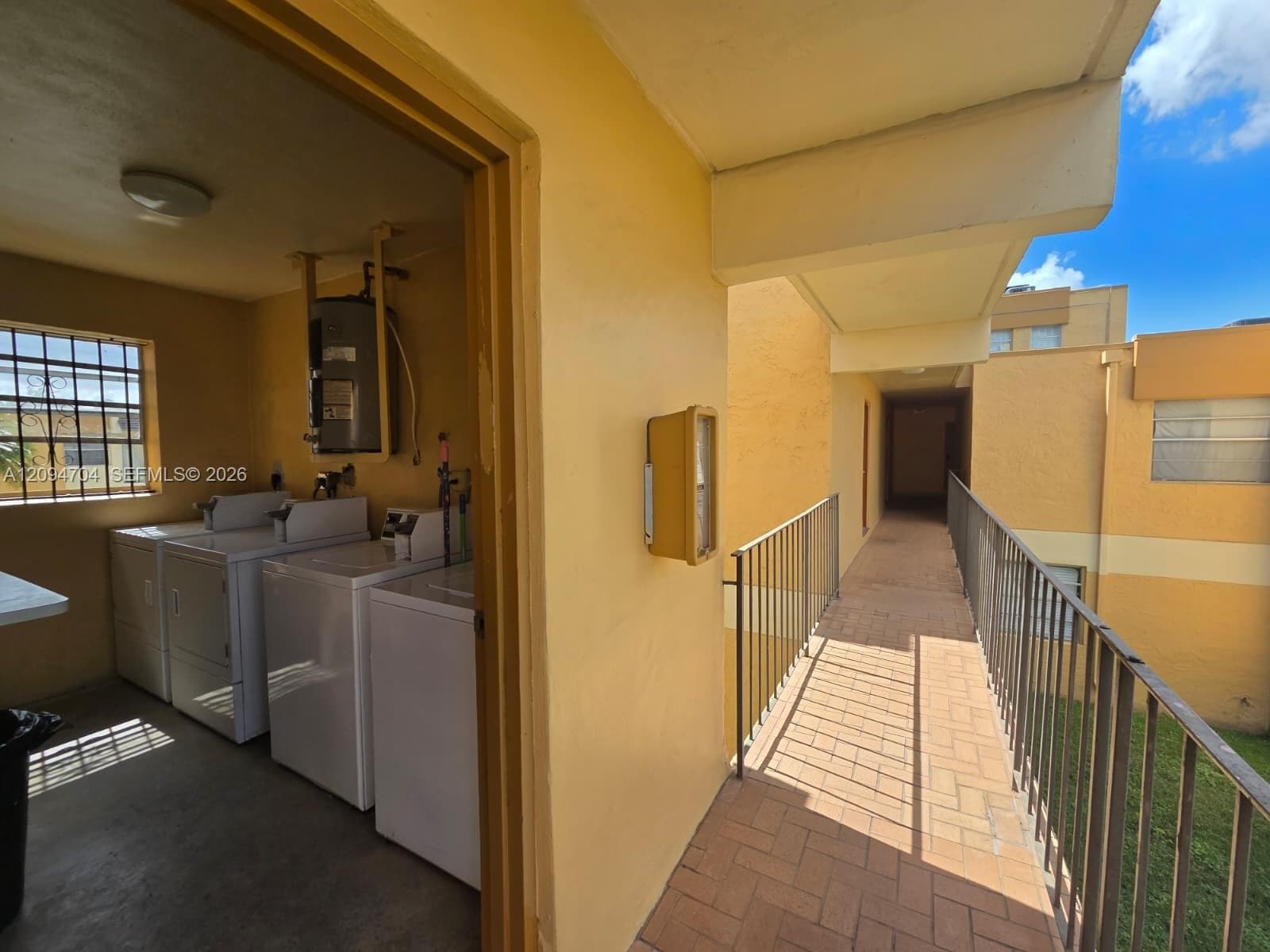laundry room 1 door away from unit